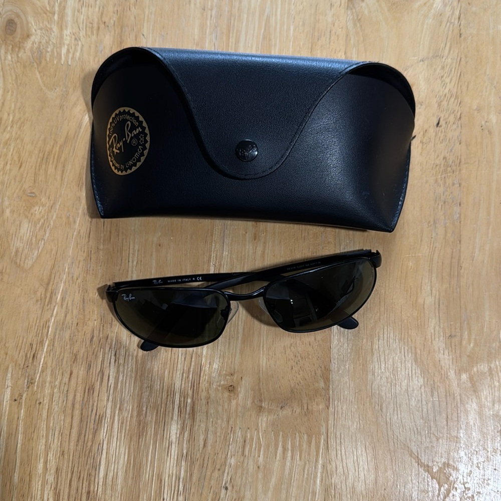 Rayban Sunglasses with grey / black lenses used in very good condition